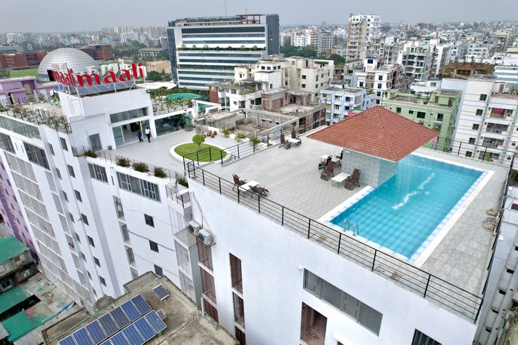 IconAirbnb building exterior with rooftop pool